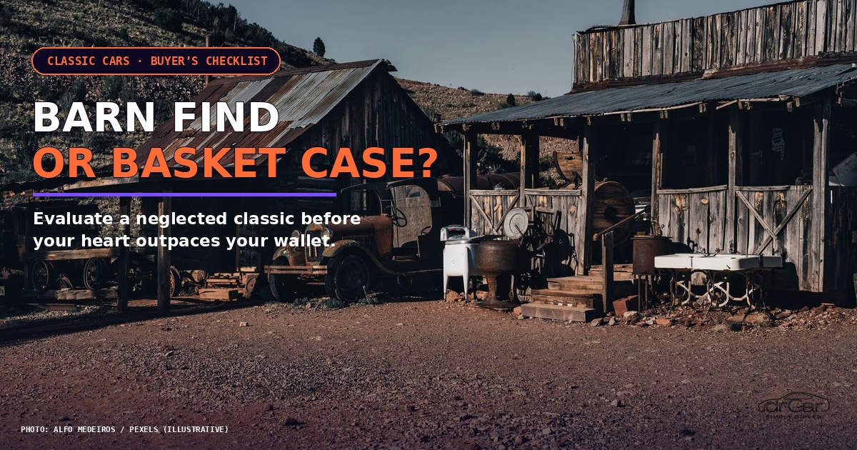 Weathered vintage car beside a rustic barn, illustrating the promise and uncertainty of a classic-car barn find